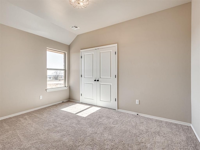 1995 Classic Run, Blanchard, OK 73010 - unfurnished bedroom with carpet floors, baseboards, and lofted ceiling