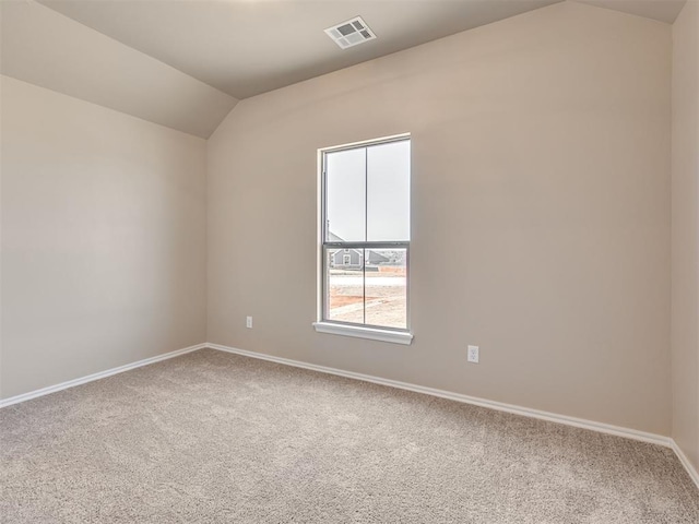 1995 Classic Run, Blanchard, OK 73010 - spare room with vaulted ceiling, carpet floors, and baseboards