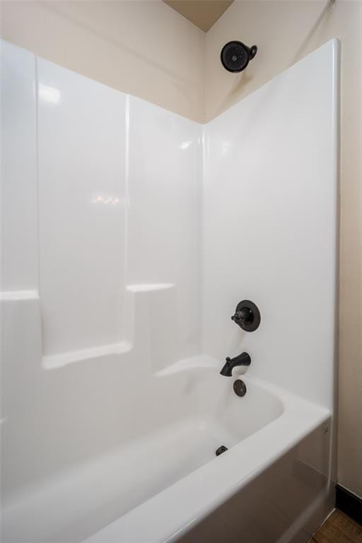 bathroom with shower / bathing tub combination