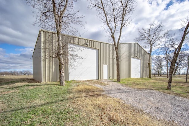 view of outbuilding with a garage