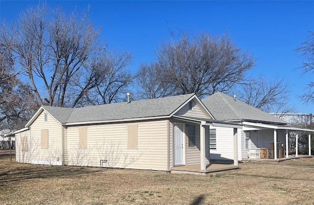 view of property exterior with a lawn