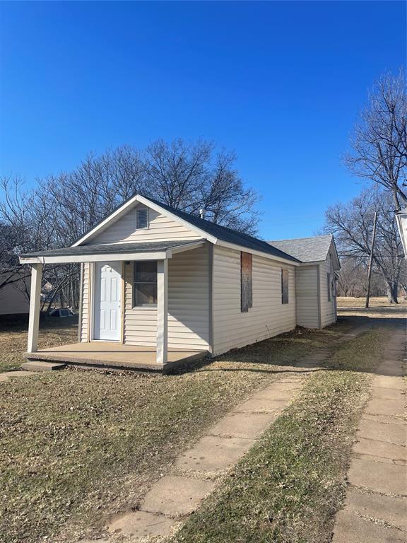 view of home's exterior featuring covered porch