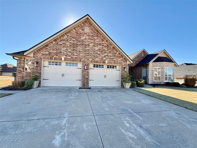 view of front of property with a garage