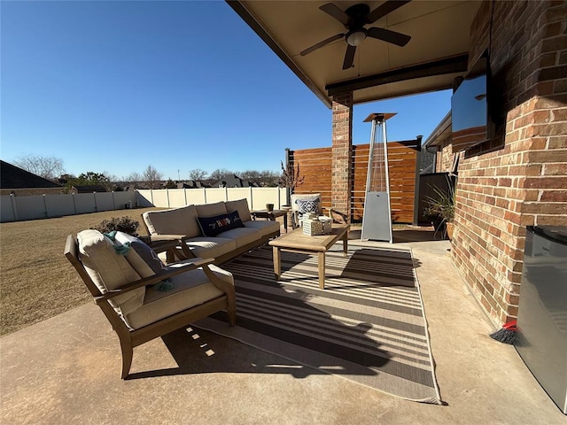 view of patio featuring ceiling fan and an outdoor hangout area