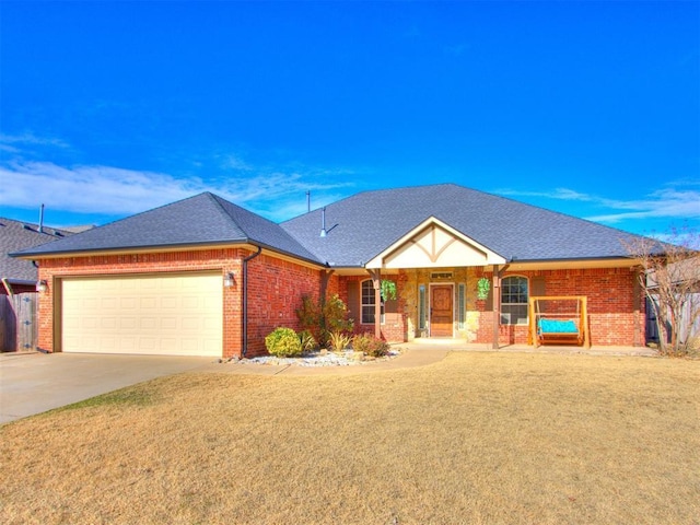 ranch-style house featuring a garage