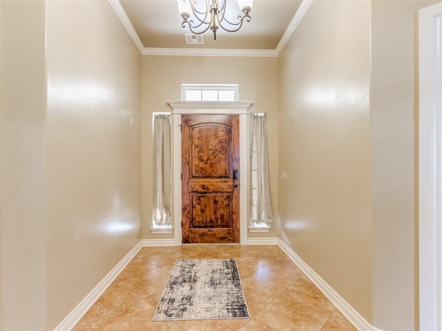 entryway with ornamental molding and a notable chandelier