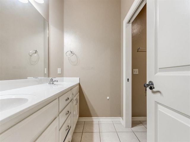 bathroom with vanity and tile patterned floors