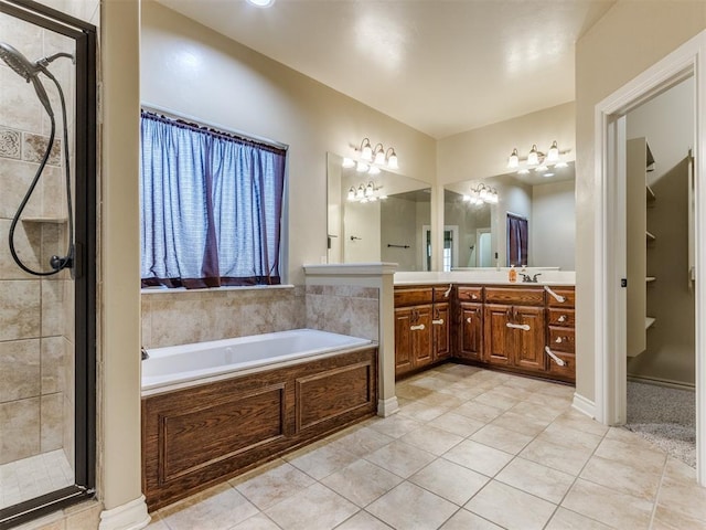 bathroom with vanity, separate shower and tub, and tile patterned floors