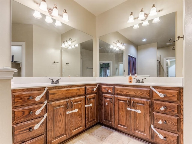 bathroom with vanity and tile patterned flooring