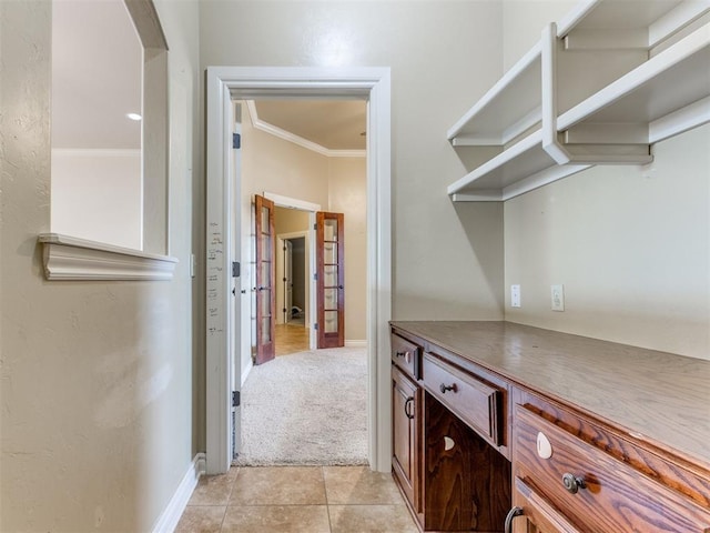 spacious closet with light carpet