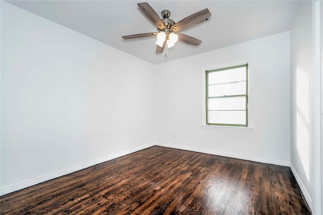 unfurnished room featuring ceiling fan and dark wood-type flooring