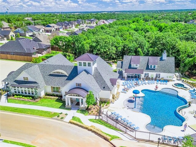 birds eye view of property with a residential view