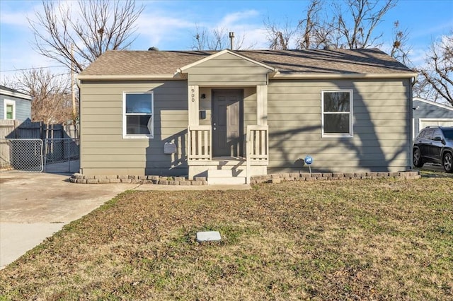 bungalow with a front lawn