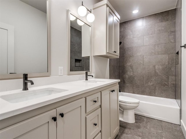 1203 Jaden Blvd, Tuttle, OK 73089 - full bathroom featuring toilet, double vanity, shower / bathtub combination, and recessed lighting