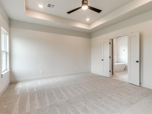 1203 Jaden Blvd, Tuttle, OK 73089 - spare room with a ceiling fan, healthy amount of natural light, light colored carpet, and recessed lighting
