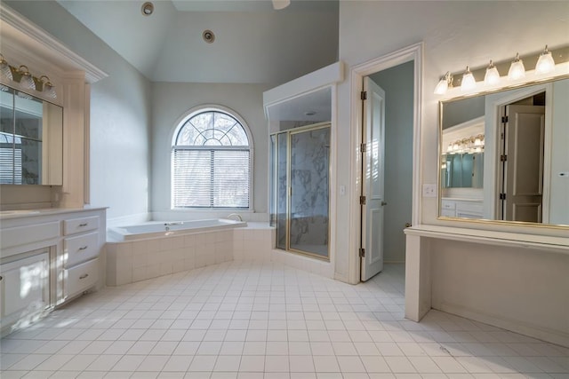 bathroom with separate shower and tub, tile patterned floors, vanity, and vaulted ceiling