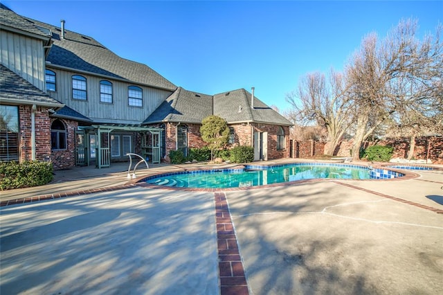 view of pool with a patio