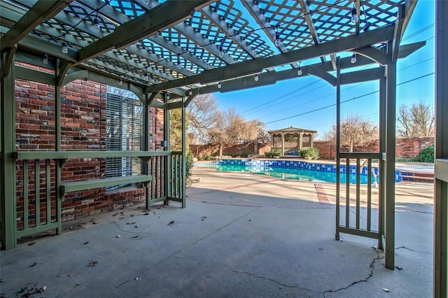 view of patio / terrace featuring a pergola