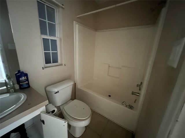 full bathroom with tile patterned floors, vanity, toilet, and shower / tub combination