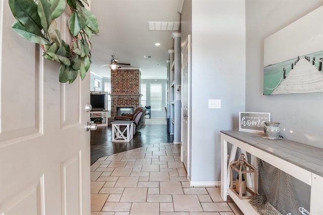 hallway with light tile patterned floors