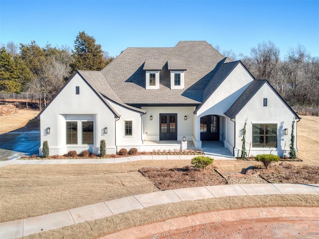 view of front of house with french doors