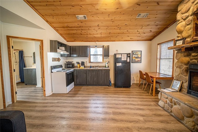 kitchen featuring wood ceiling, dark brown cabinetry, black appliances, and lofted ceiling