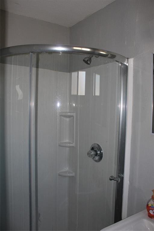 bathroom with walk in shower