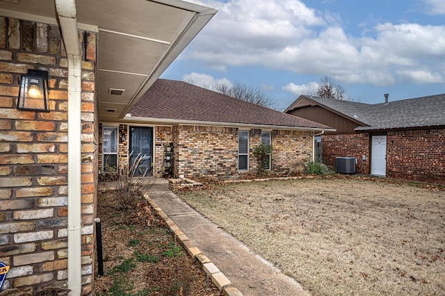 exterior space featuring central AC unit