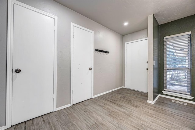 foyer featuring light hardwood / wood-style flooring