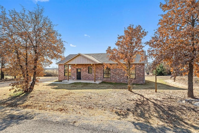 single story home featuring a patio area