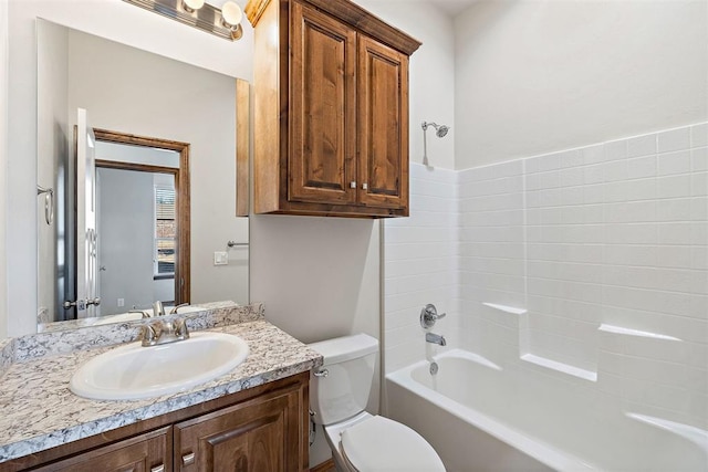 full bathroom featuring vanity, shower / bathtub combination, and toilet