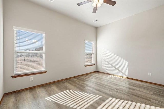 unfurnished room with light hardwood / wood-style floors and ceiling fan