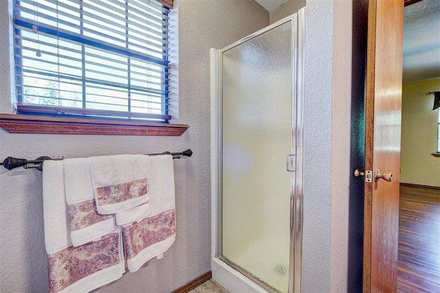 bathroom featuring walk in shower