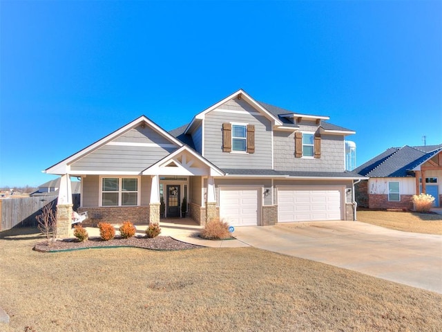 craftsman inspired home featuring a porch and a garage