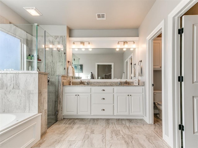 full bathroom featuring vanity, plus walk in shower, and toilet