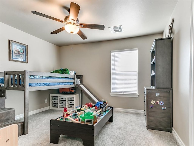 carpeted bedroom featuring ceiling fan