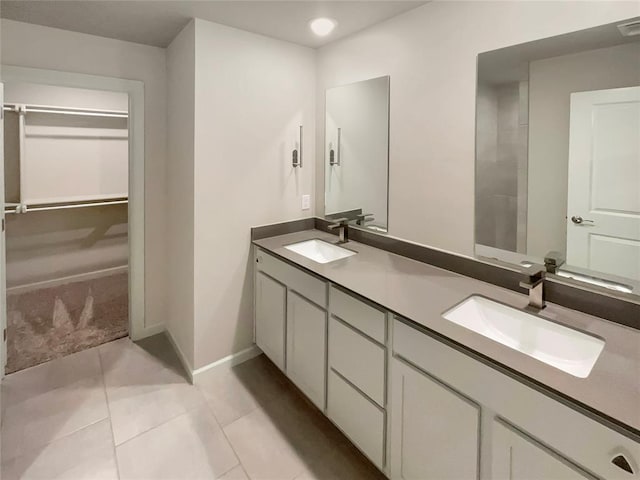 bathroom with vanity and tile patterned floors