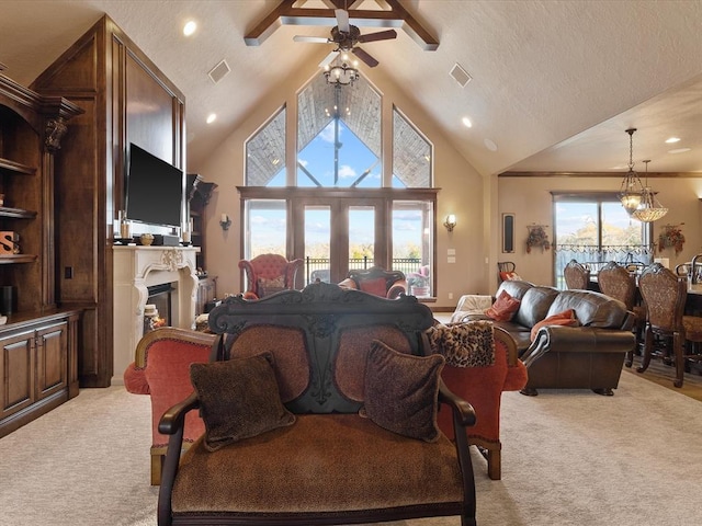 5451 Cottonwood Creek Cir, Norman, OK 73069 - living room with light carpet, ceiling fan, a fireplace, recessed lighting, and high vaulted ceiling