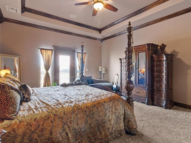 5451 Cottonwood Creek Cir, Norman, OK 73069 - bedroom with carpet flooring, ornamental molding, a tray ceiling, access to exterior, and a ceiling fan