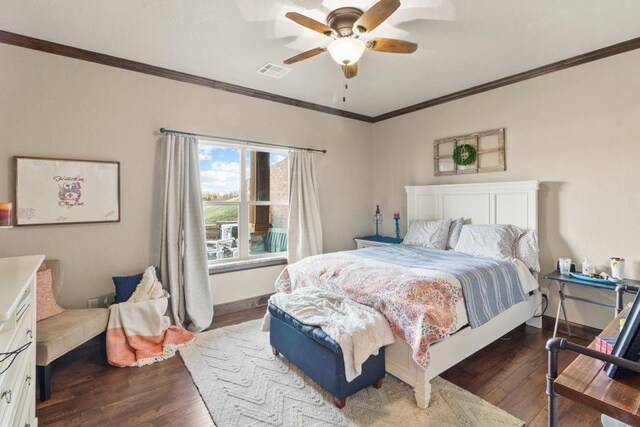 5451 Cottonwood Creek Cir, Norman, OK 73069 - bedroom featuring wood finished floors, crown molding, baseboards, and ceiling fan