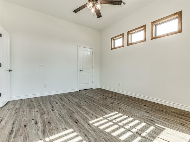 unfurnished room featuring ceiling fan and light hardwood / wood-style flooring