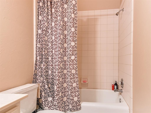 full bathroom featuring vanity, toilet, and shower / bathtub combination with curtain