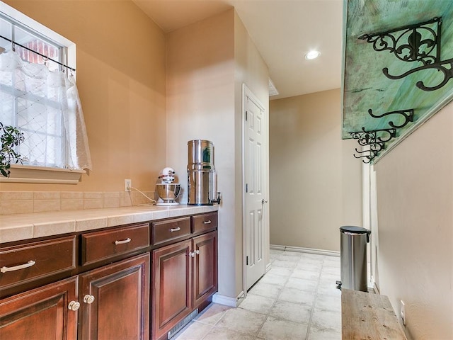 bathroom with vanity and a healthy amount of sunlight