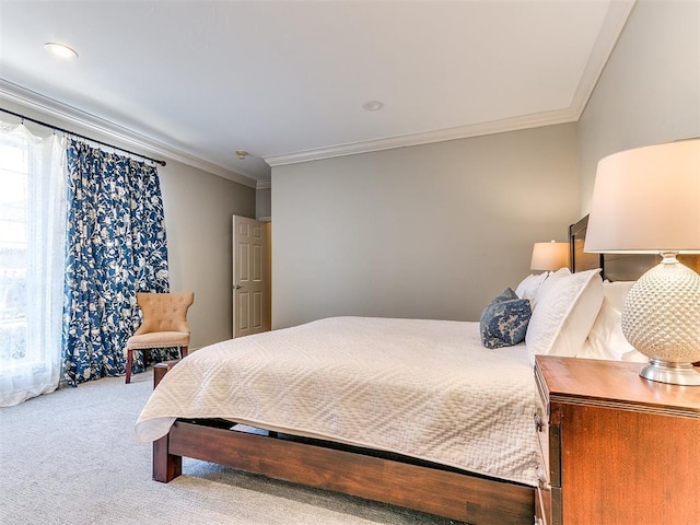 bedroom with carpet floors and ornamental molding