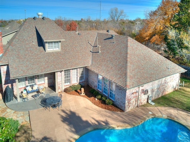 view of swimming pool featuring a patio