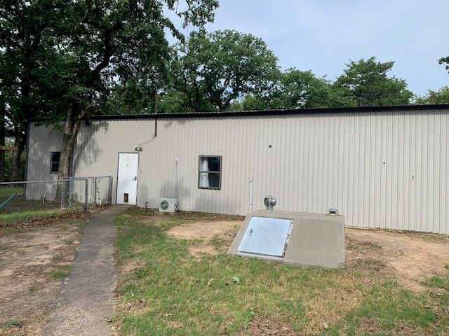 view of entry to storm shelter