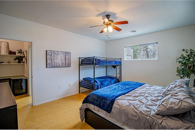 bedroom featuring ceiling fan and light wood-type flooring