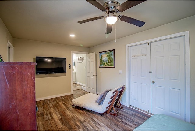 bedroom featuring dark wood-type flooring and ceiling fan