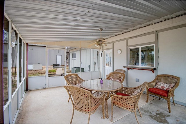 sunroom / solarium with ceiling fan