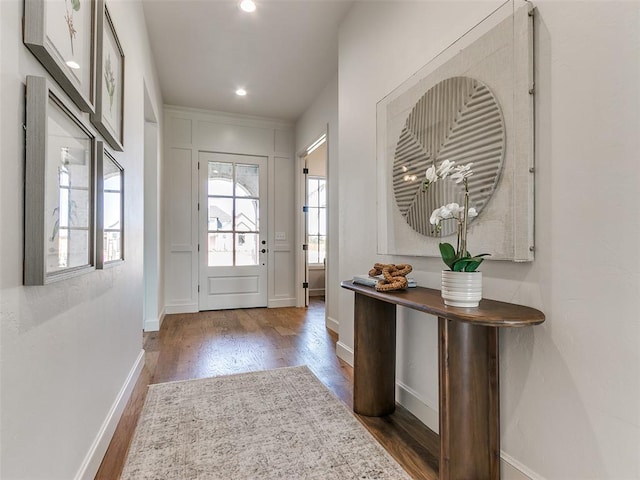 doorway to outside with dark hardwood / wood-style flooring